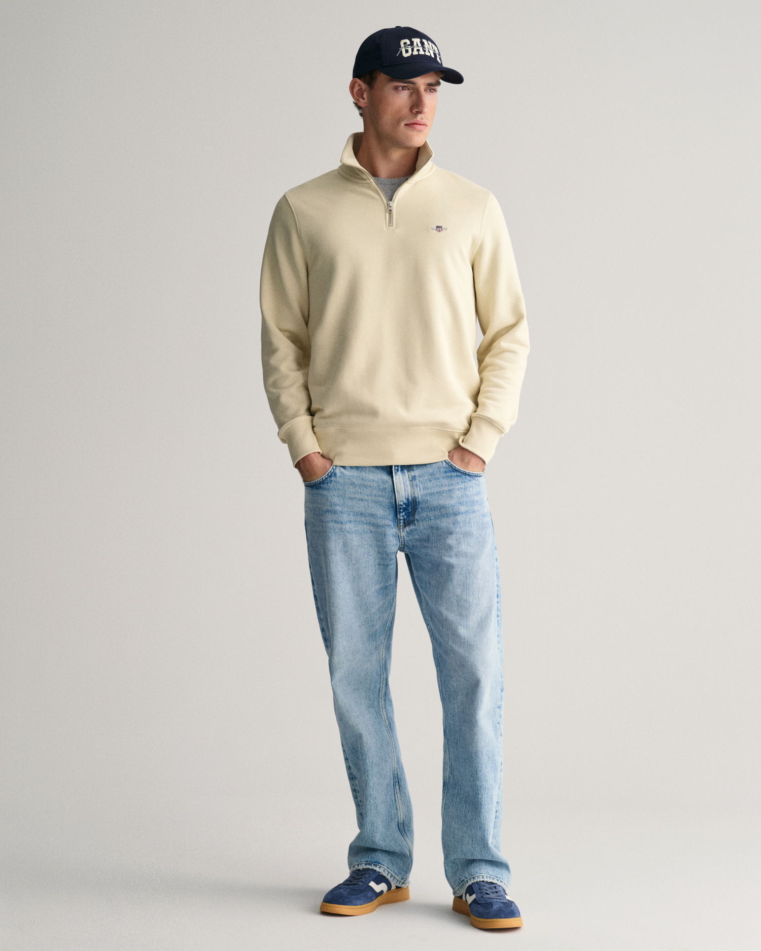Collegegenser med høy hals og half-zip