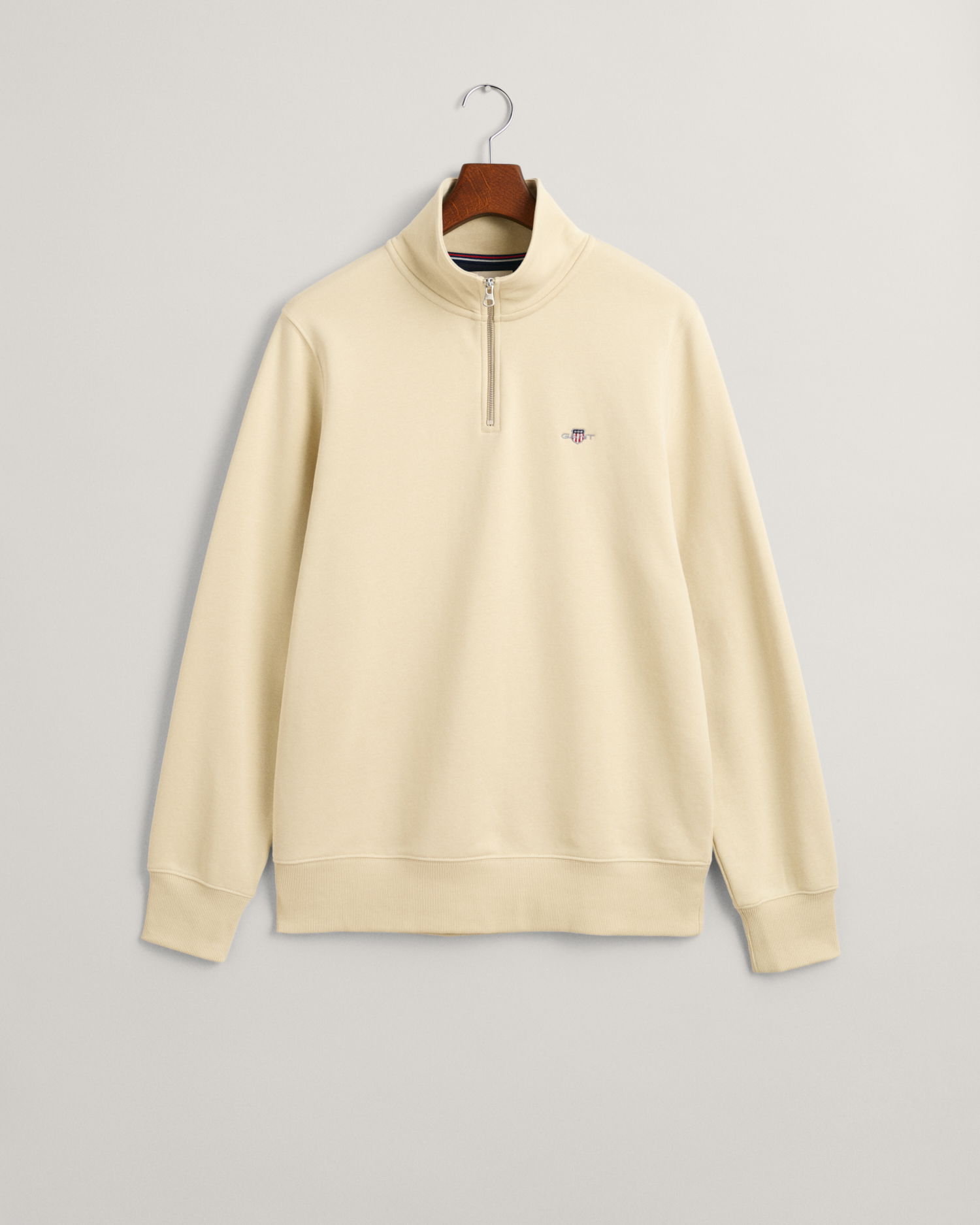 Collegegenser med høy hals og half-zip
