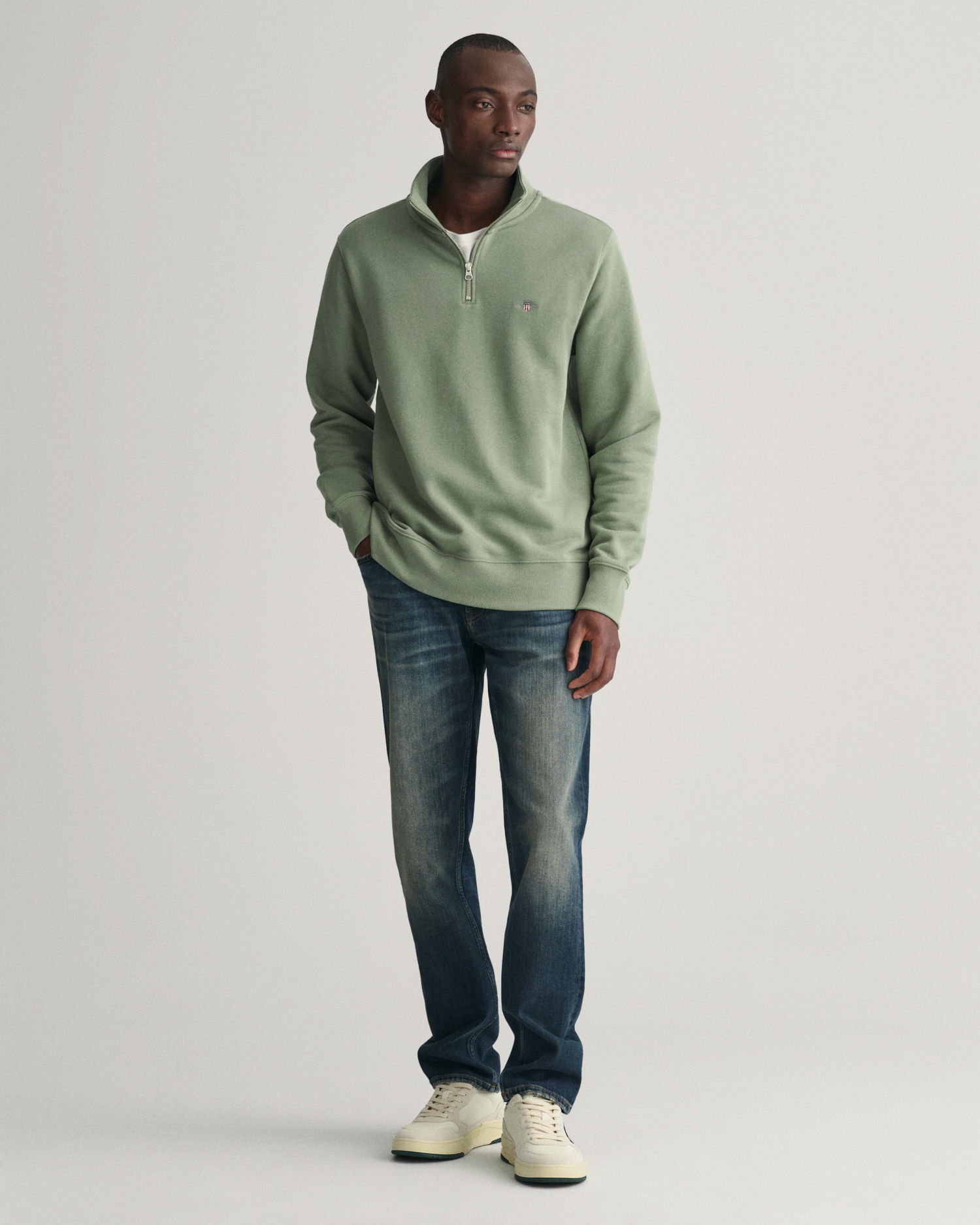 Shield collegegenser med half-zip