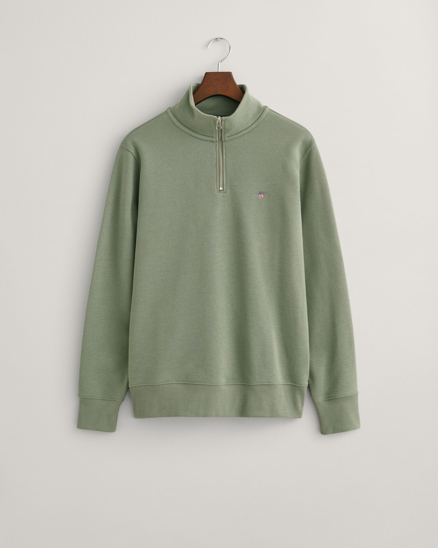 Shield collegegenser med half-zip