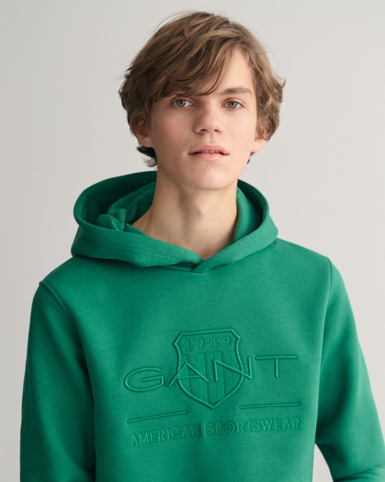 Teens hettegenser med ensfarget logo