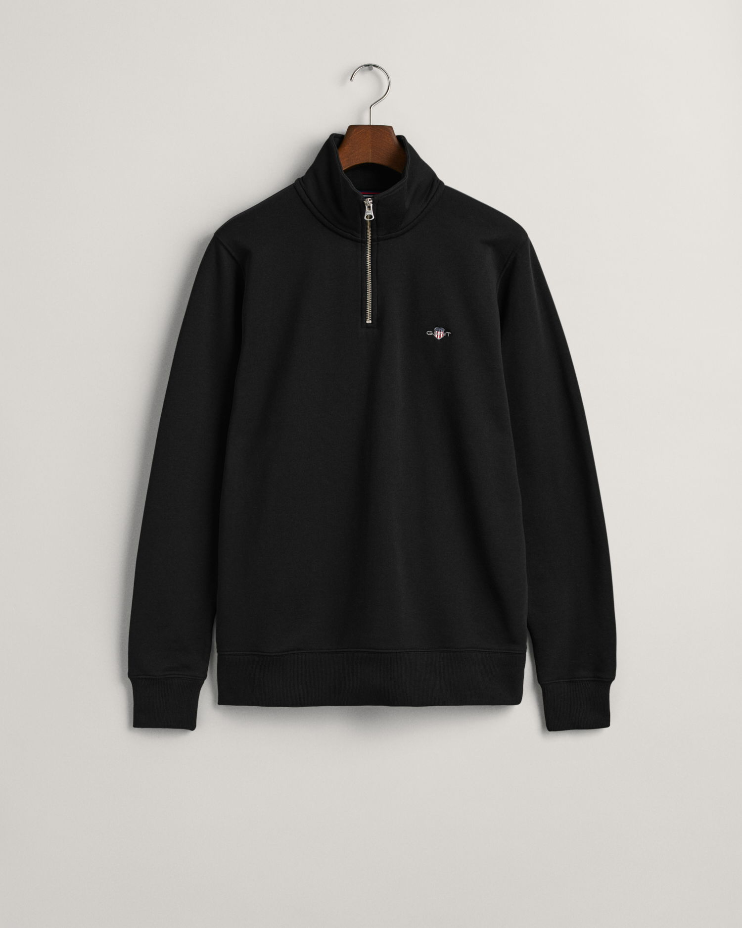 Shield collegegenser med half-zip