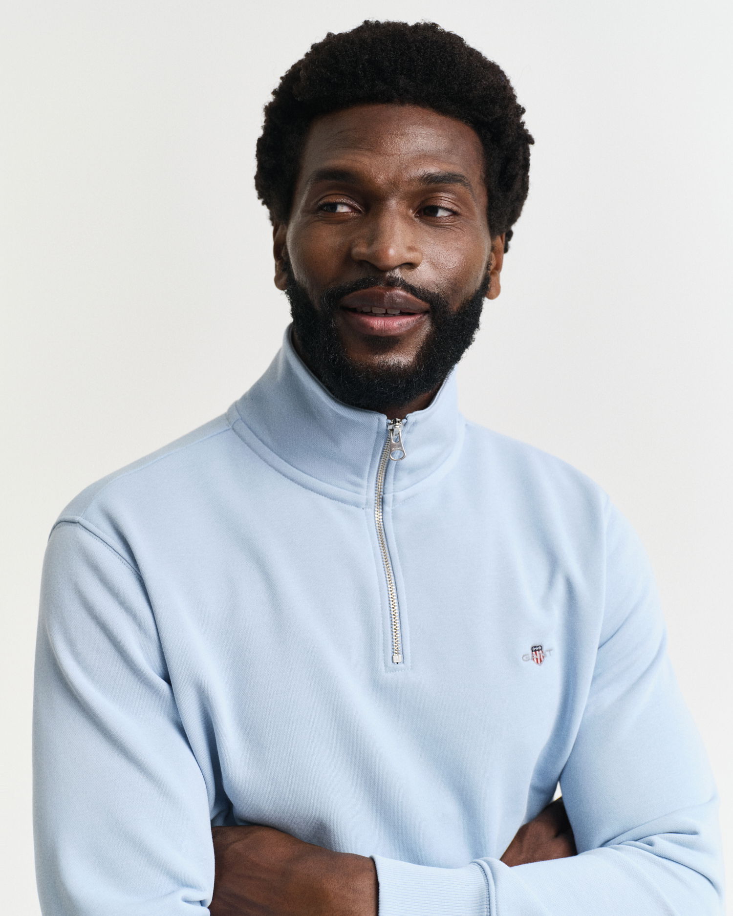 Shield collegegenser med half-zip
