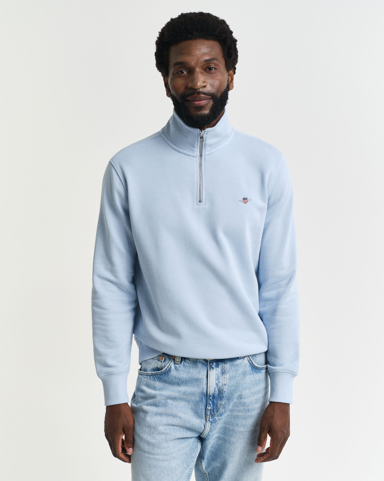 Shield collegegenser med half-zip
