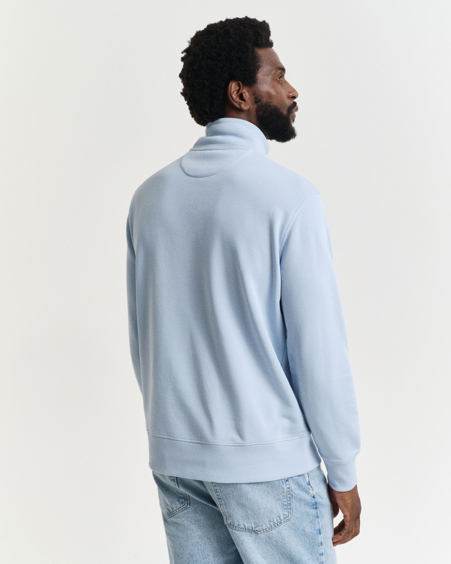Shield collegegenser med half-zip