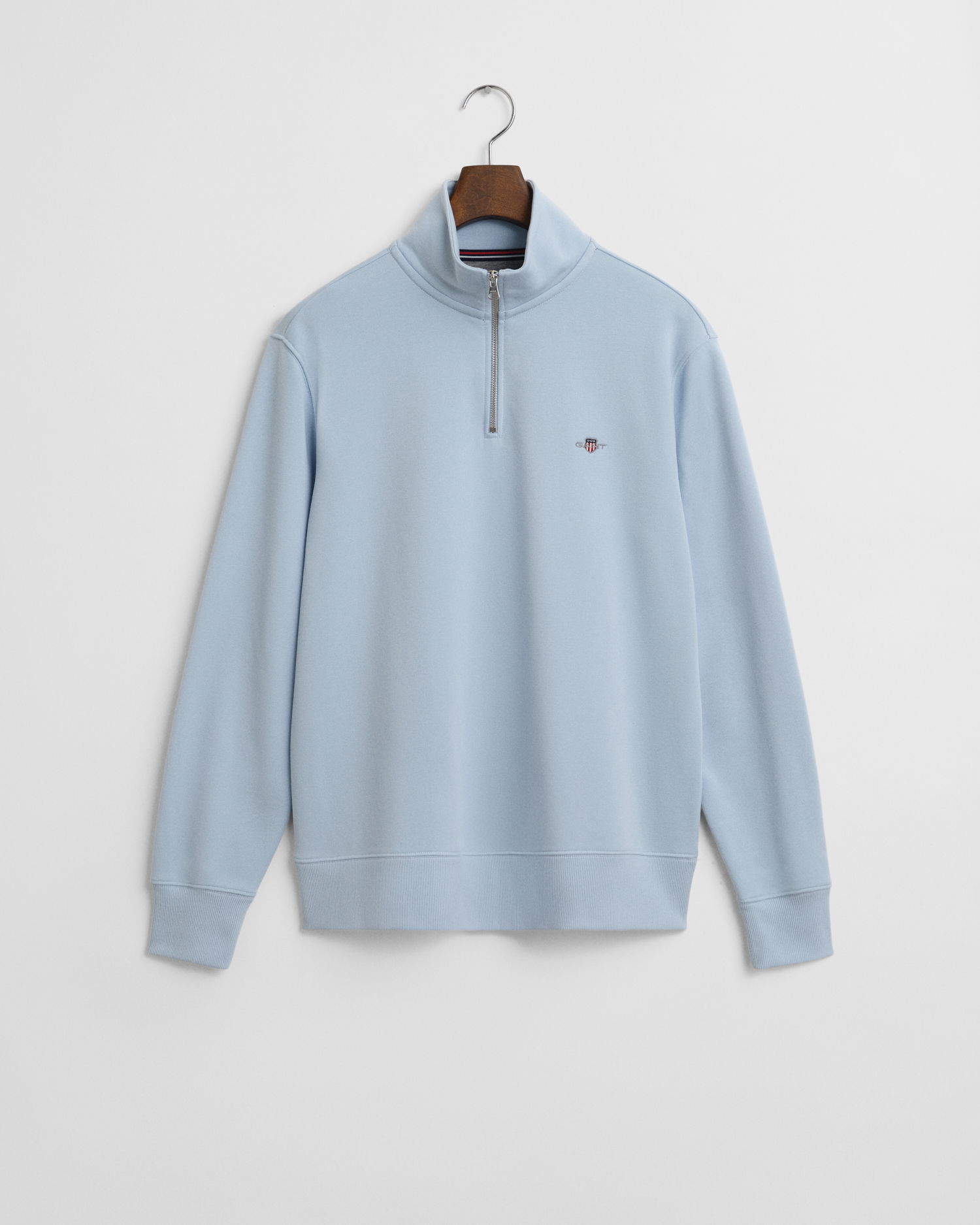 Shield collegegenser med half-zip