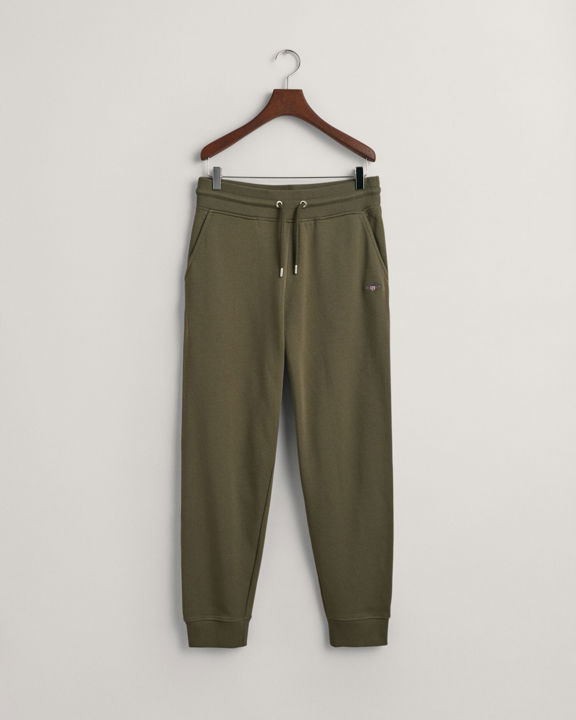 Joggebukser med liten shield-logo